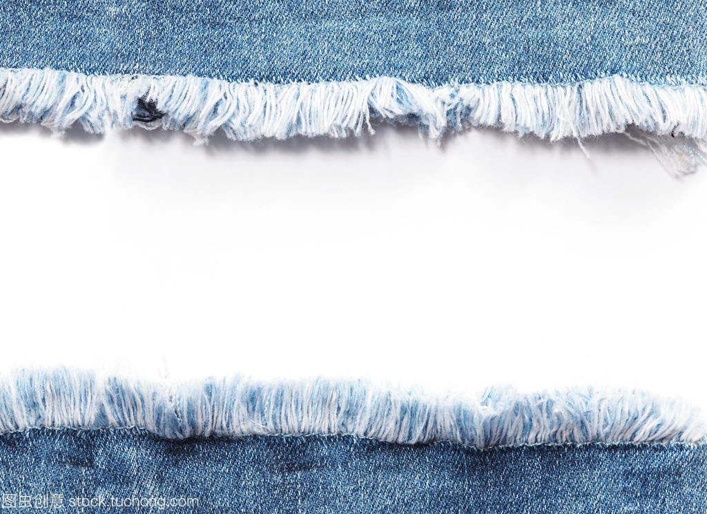 粗獷的時尚 邊緣幀下的藍(lán)色斜紋牛仔褲